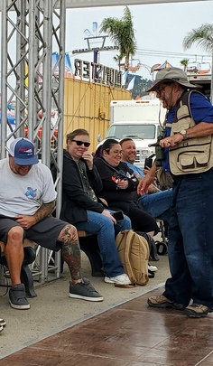 Crowd photo - the man in the photo is having a wonderful time