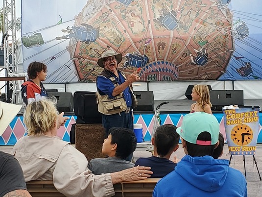 Kids enjoying the Camping Magic Show